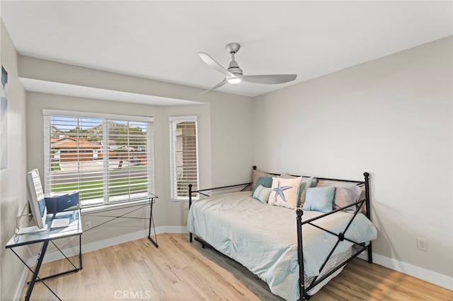 28646 Patti Ln, Menifee, CA 92585 - bedroom with light wood-type flooring, baseboards, and a ceiling fan