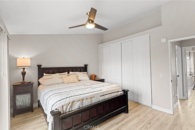 28646 Patti Ln, Menifee, CA 92585 - bedroom featuring light wood-style flooring, a closet, baseboards, lofted ceiling, and ceiling fan