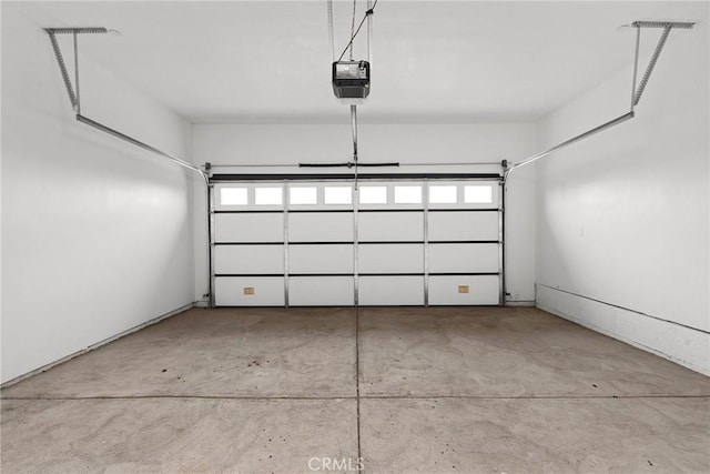 garage featuring a garage door opener