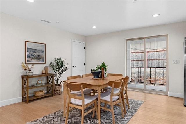 dining room with recessed lighting, visible vents, and light wood-style floors