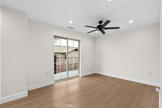 empty room featuring visible vents, ceiling fan, recessed lighting, and baseboards