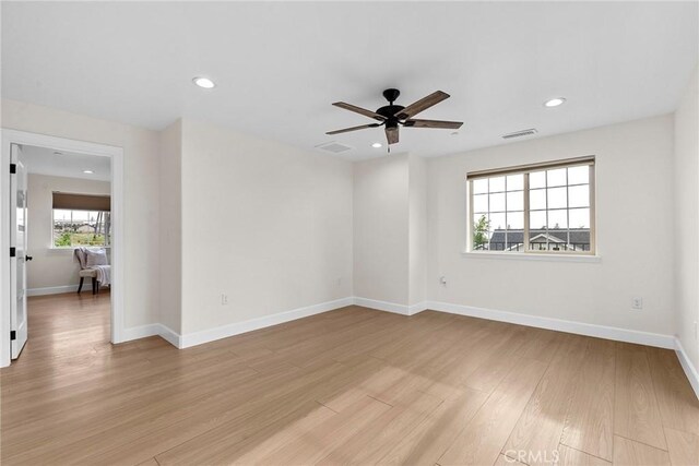 unfurnished room featuring visible vents, ceiling fan, light wood finished floors, and recessed lighting