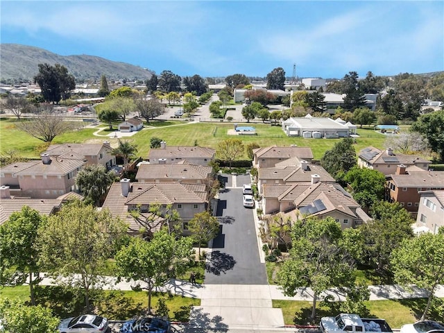 drone / aerial view with a mountain view and a residential view