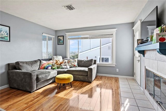 105 Joyce Way, Pismo Beach, CA 93449 - living area with light wood-style flooring and a fireplace
