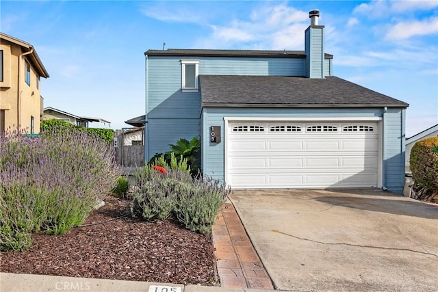 105 Joyce Way, Pismo Beach, CA 93449 - view of front of home featuring a chimney and concrete driveway