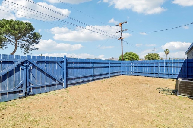 exterior space featuring a fenced backyard