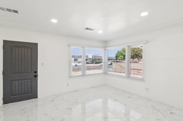empty room featuring visible vents, recessed lighting, and marble finish floor