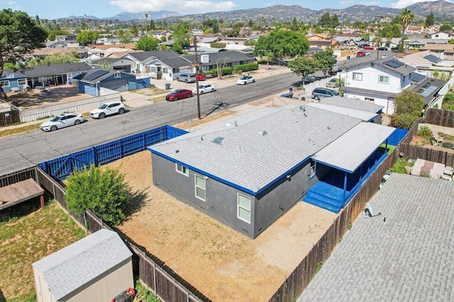 birds eye view of property featuring a residential view and a mountain view