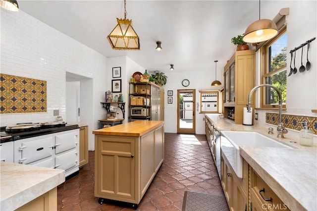 2020 N Victoria Dr, Santa Ana, CA 92706 - kitchen with tasteful backsplash, a sink, wood counters, hanging light fixtures, and dishwasher