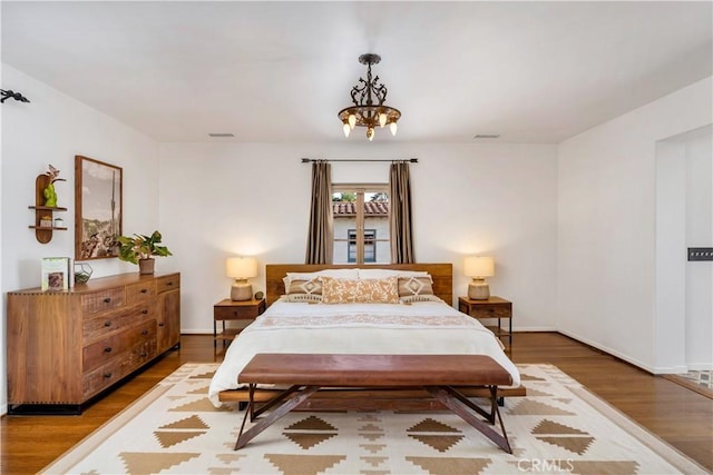 2020 N Victoria Dr, Santa Ana, CA 92706 - bedroom featuring wood finished floors and baseboards
