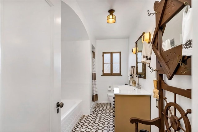 2020 N Victoria Dr, Santa Ana, CA 92706 - bathroom with toilet, vanity, baseboards, shower / bath combo, and tile patterned floors