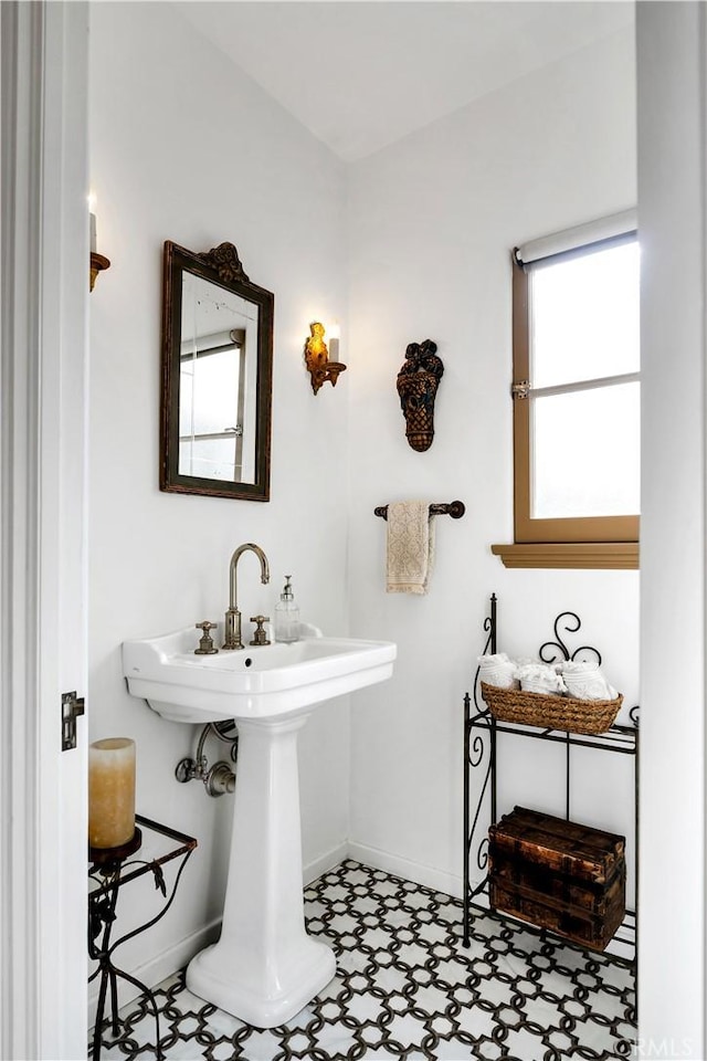 2020 N Victoria Dr, Santa Ana, CA 92706 - bathroom featuring baseboards and tile patterned floors