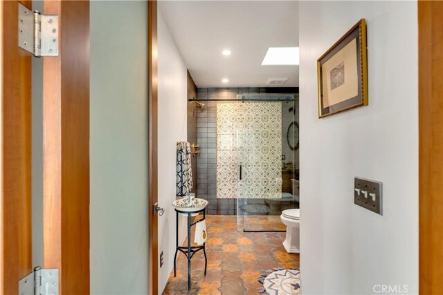 2020 N Victoria Dr, Santa Ana, CA 92706 - full bathroom with a shower stall, toilet, and recessed lighting