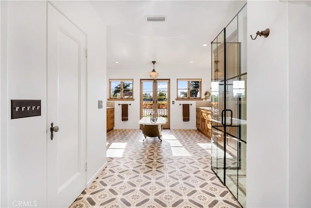 2020 N Victoria Dr, Santa Ana, CA 92706 - hall with french doors, light flooring, recessed lighting, and baseboards