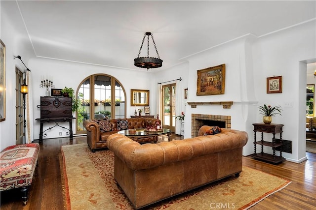 2020 N Victoria Dr, Santa Ana, CA 92706 - living area with wood finished floors and a tile fireplace