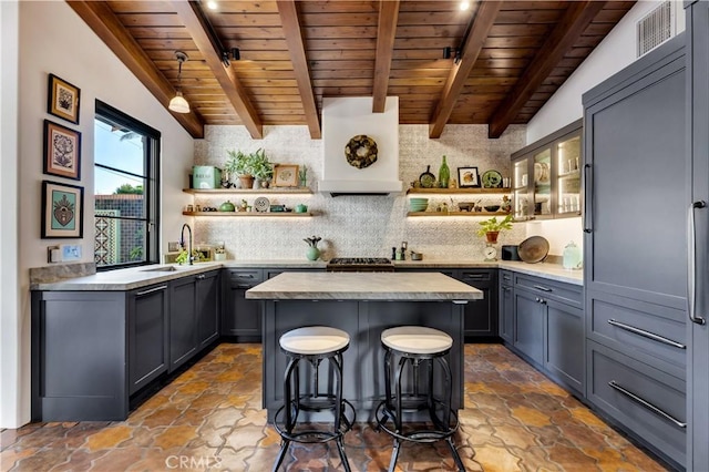 2020 N Victoria Dr, Santa Ana, CA 92706 - bar area with wooden ceiling, ventilation hood, a sink, backsplash, and beam ceiling