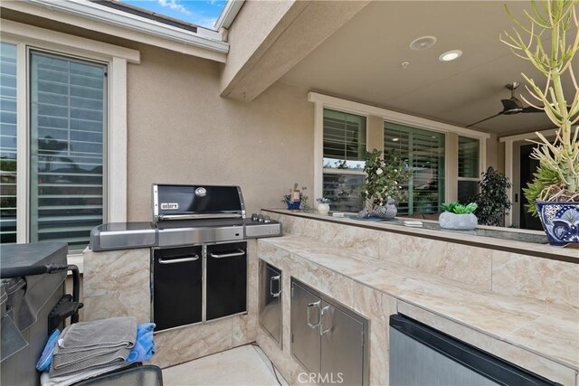 28934 Rangeview Dr, Murrieta, CA 92563 - view of patio with an outdoor kitchen and ceiling fan