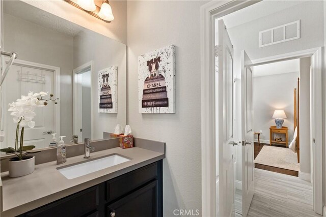 28934 Rangeview Dr, Murrieta, CA 92563 - bathroom with vanity and ensuite bathroom