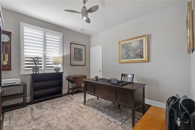 28934 Rangeview Dr, Murrieta, CA 92563 - home office featuring ceiling fan, baseboards, and wood finished floors