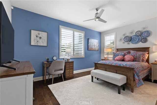 28934 Rangeview Dr, Murrieta, CA 92563 - bedroom featuring dark wood finished floors, baseboards, and a ceiling fan