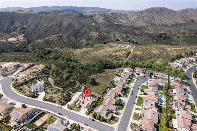 28934 Rangeview Dr, Murrieta, CA 92563 - aerial view of property and surrounding area with a mountain backdrop and nearby suburban area