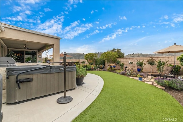 28934 Rangeview Dr, Murrieta, CA 92563 - view of yard featuring a hot tub, ceiling fan, and a patio