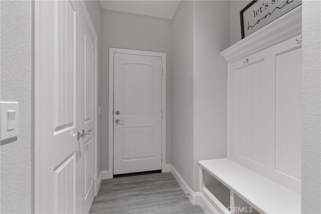 28934 Rangeview Dr, Murrieta, CA 92563 - mudroom with light wood-type flooring and baseboards