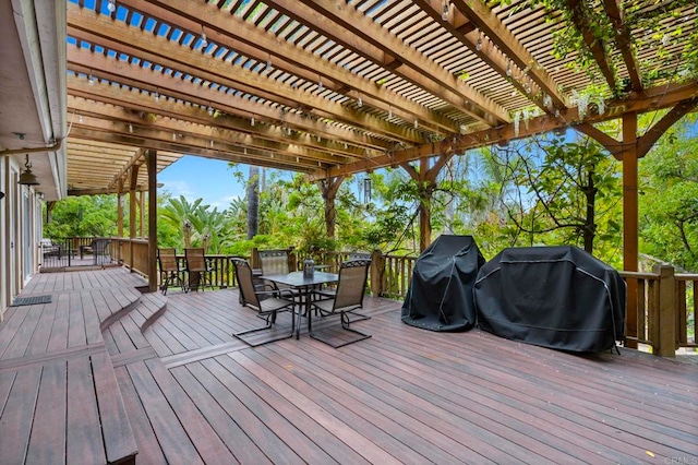 3161921 Via Puerta Del Sol, Bonsall, CA 92003 - wooden deck with outdoor dining space, area for grilling, and a pergola