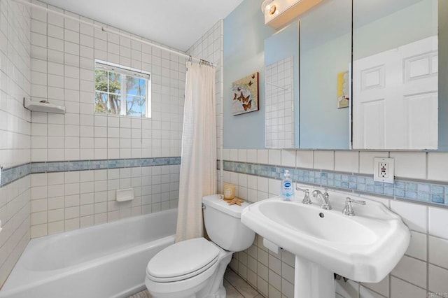 3161921 Via Puerta Del Sol, Bonsall, CA 92003 - full bath featuring toilet, tile walls, a sink, and shower / tub combo with curtain