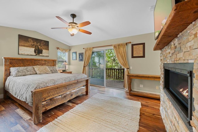 3161921 Via Puerta Del Sol, Bonsall, CA 92003 - bedroom with lofted ceiling, hardwood / wood-style flooring, ceiling fan, a glass covered fireplace, and access to outside