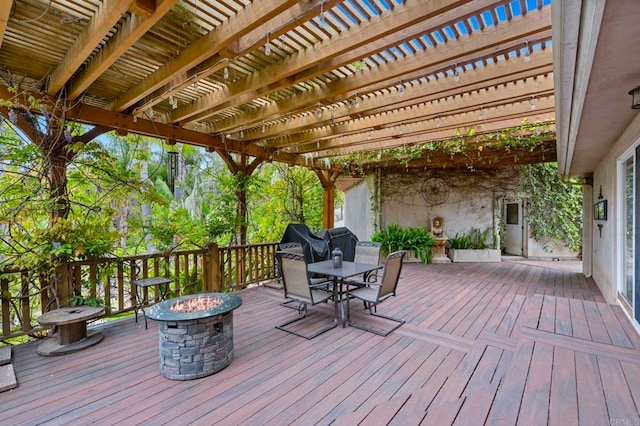 3161921 Via Puerta Del Sol, Bonsall, CA 92003 - wooden terrace featuring a pergola, outdoor dining space, and an outdoor fire pit
