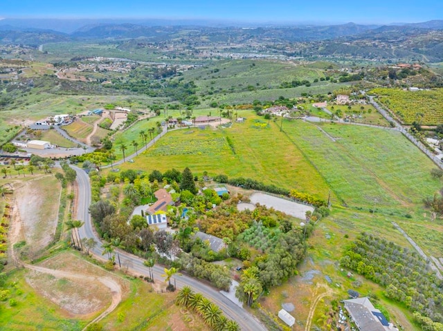 3161921 Via Puerta Del Sol, Bonsall, CA 92003 - aerial view featuring a mountain view and a rural view