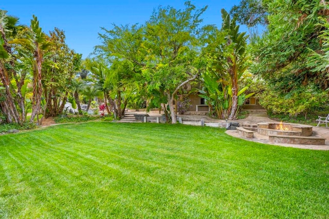 3161921 Via Puerta Del Sol, Bonsall, CA 92003 - view of yard featuring a fire pit