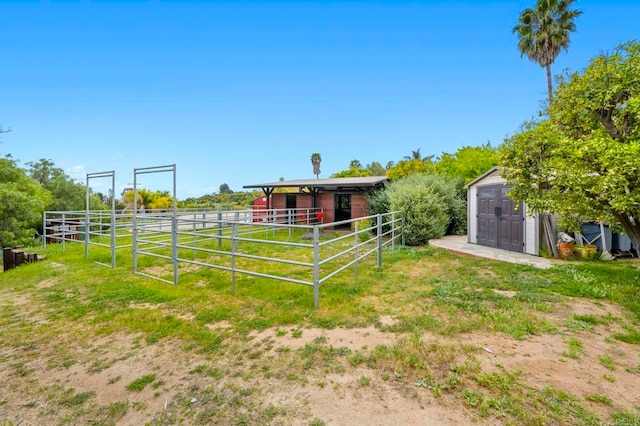 3161921 Via Puerta Del Sol, Bonsall, CA 92003 - view of yard featuring an outdoor structure and an exterior structure
