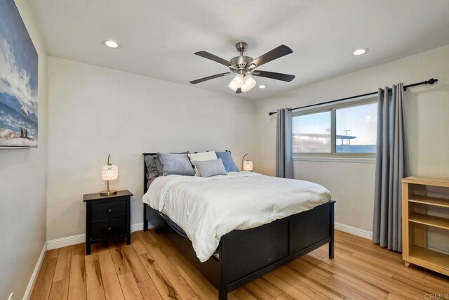 1202 N Pacific St Unit 201B, Oceanside, CA 92054 - bedroom featuring baseboards, a ceiling fan, recessed lighting, and light wood-style flooring