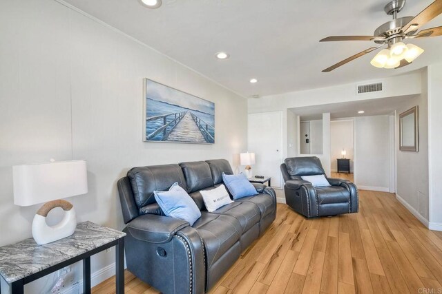 1202 N Pacific St Unit 201B, Oceanside, CA 92054 - living room with ceiling fan, recessed lighting, baseboards, light wood-type flooring, and visible vents