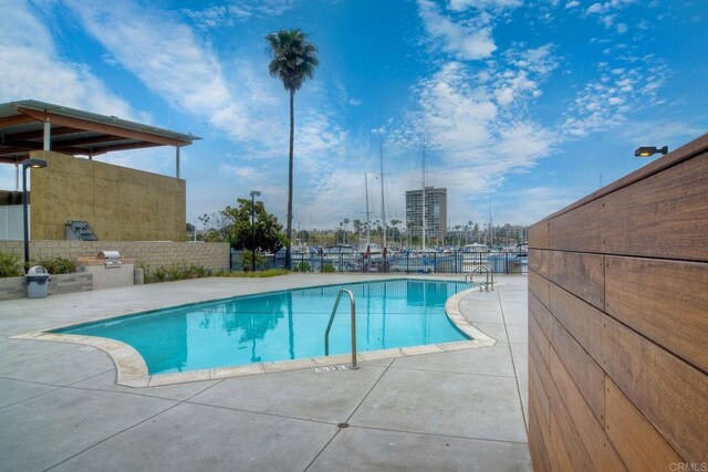 1202 N Pacific St Unit 201B, Oceanside, CA 92054 - pool featuring fence and a patio area