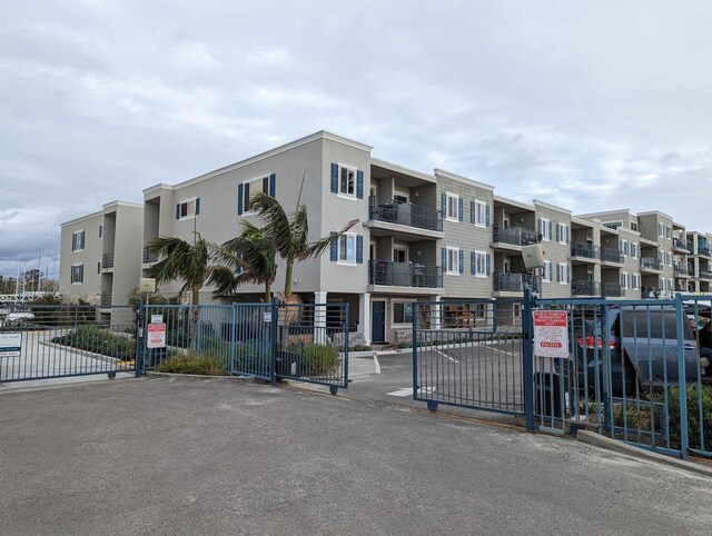 1202 N Pacific St Unit 201B, Oceanside, CA 92054 - view of building exterior featuring fence