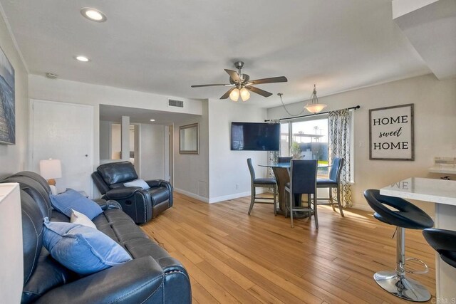 1202 N Pacific St Unit 201B, Oceanside, CA 92054 - living room with ceiling fan, light wood-style floors, recessed lighting, baseboards, and visible vents