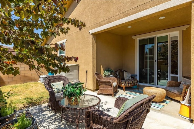 view of patio / terrace with fence
