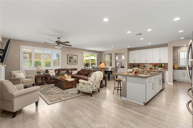 30525 Hawkscrest Rd, Murrieta, CA 92563 - living area with ceiling fan, light wood-style floors, and recessed lighting