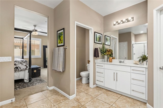 30525 Hawkscrest Rd, Murrieta, CA 92563 - full bath featuring ceiling fan, tile patterned flooring, toilet, ensuite bath, and baseboards