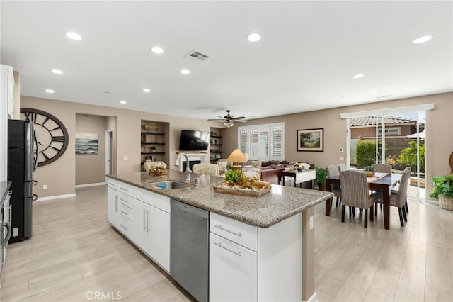 30525 Hawkscrest Rd, Murrieta, CA 92563 - kitchen with a sink, dishwasher, freestanding refrigerator, a kitchen island with sink, and light wood-type flooring