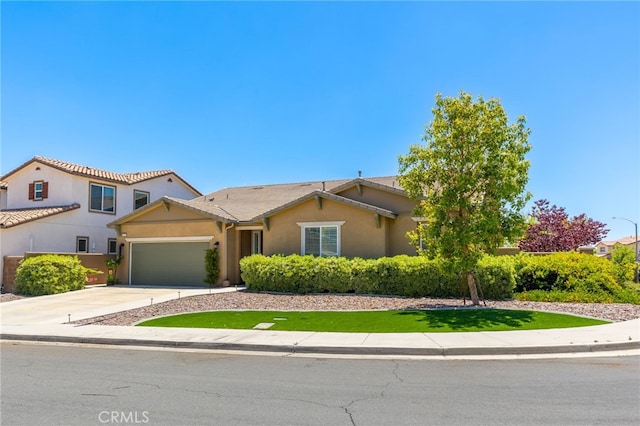 30525 Hawkscrest Rd, Murrieta, CA 92563 - view of front of property featuring a garage, concrete driveway, and stucco siding