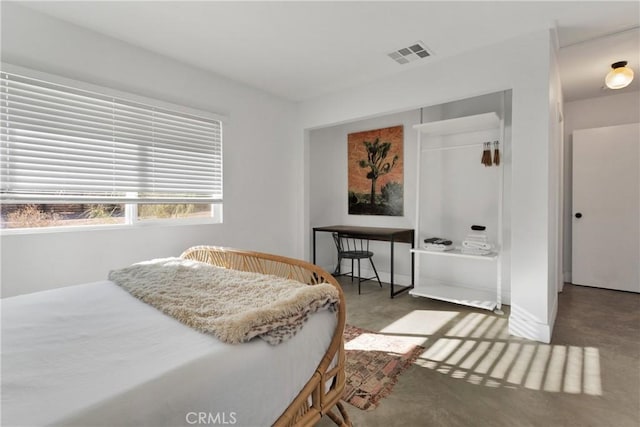 4789 Avenida Del Sol, Joshua Tree, CA 92252 - bedroom featuring concrete flooring and a closet