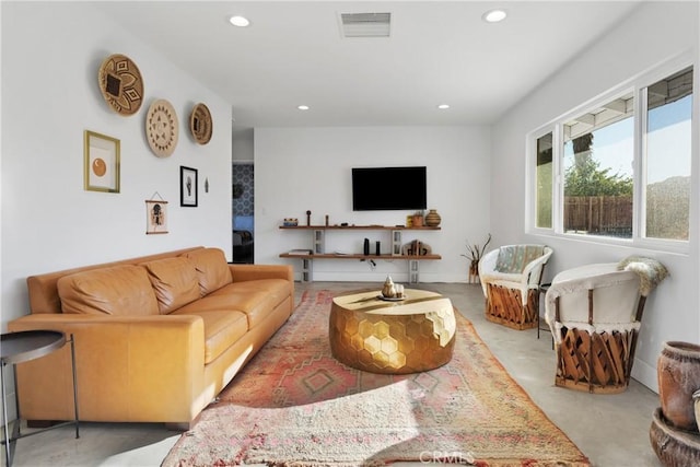 living room with visible vents and recessed lighting