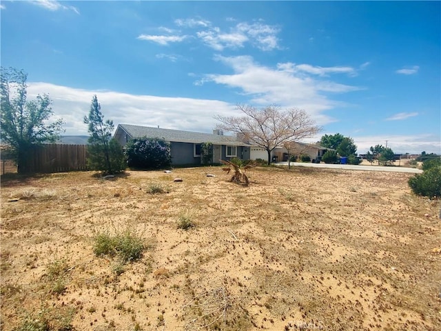 view of yard featuring fence