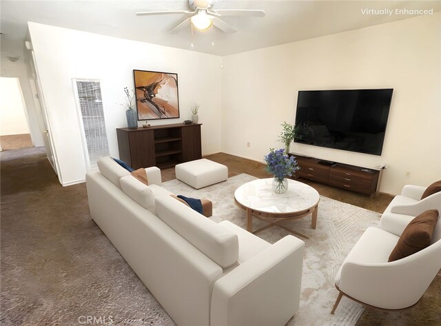 18225 Casaba Rd, Adelanto, CA 92301 - living area featuring carpet floors, baseboards, a ceiling fan, and a heating unit