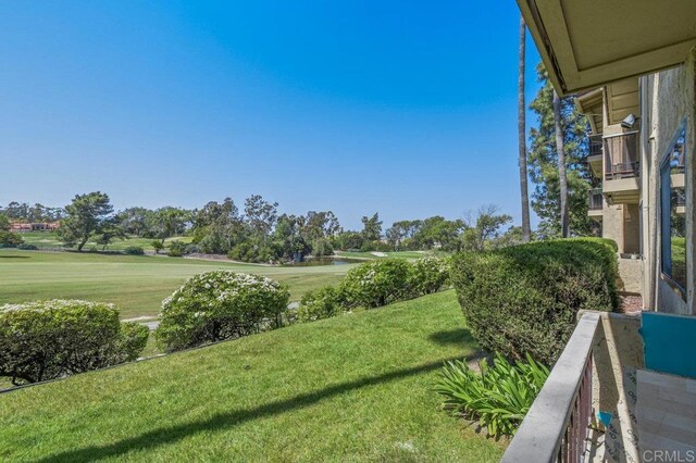 12250 Corte Sabio Unit 2103, San Diego, CA 92128 - view of community featuring a water view, a yard, and view of golf course