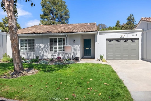 view of front facade featuring concrete driveway, an attached garage, a tile roof, and a front lawn